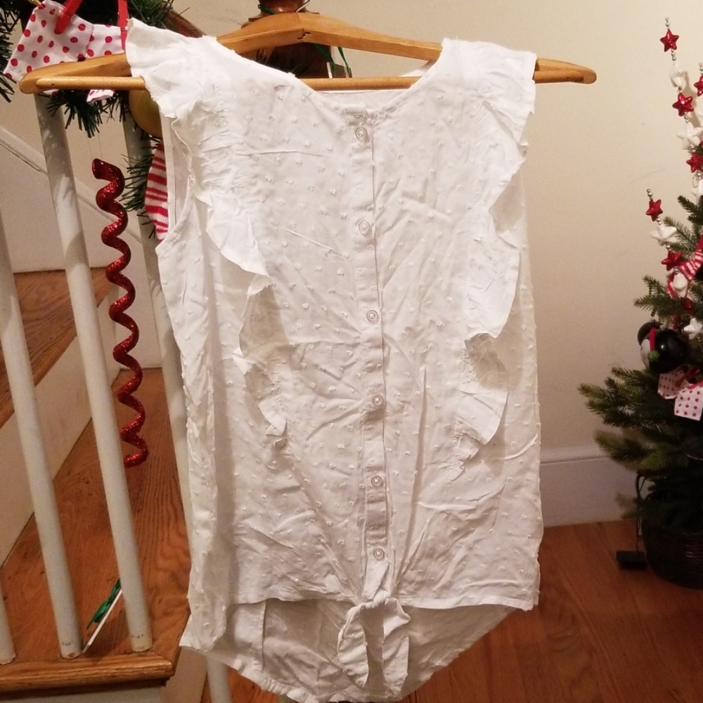 White ruffle sleeveless top